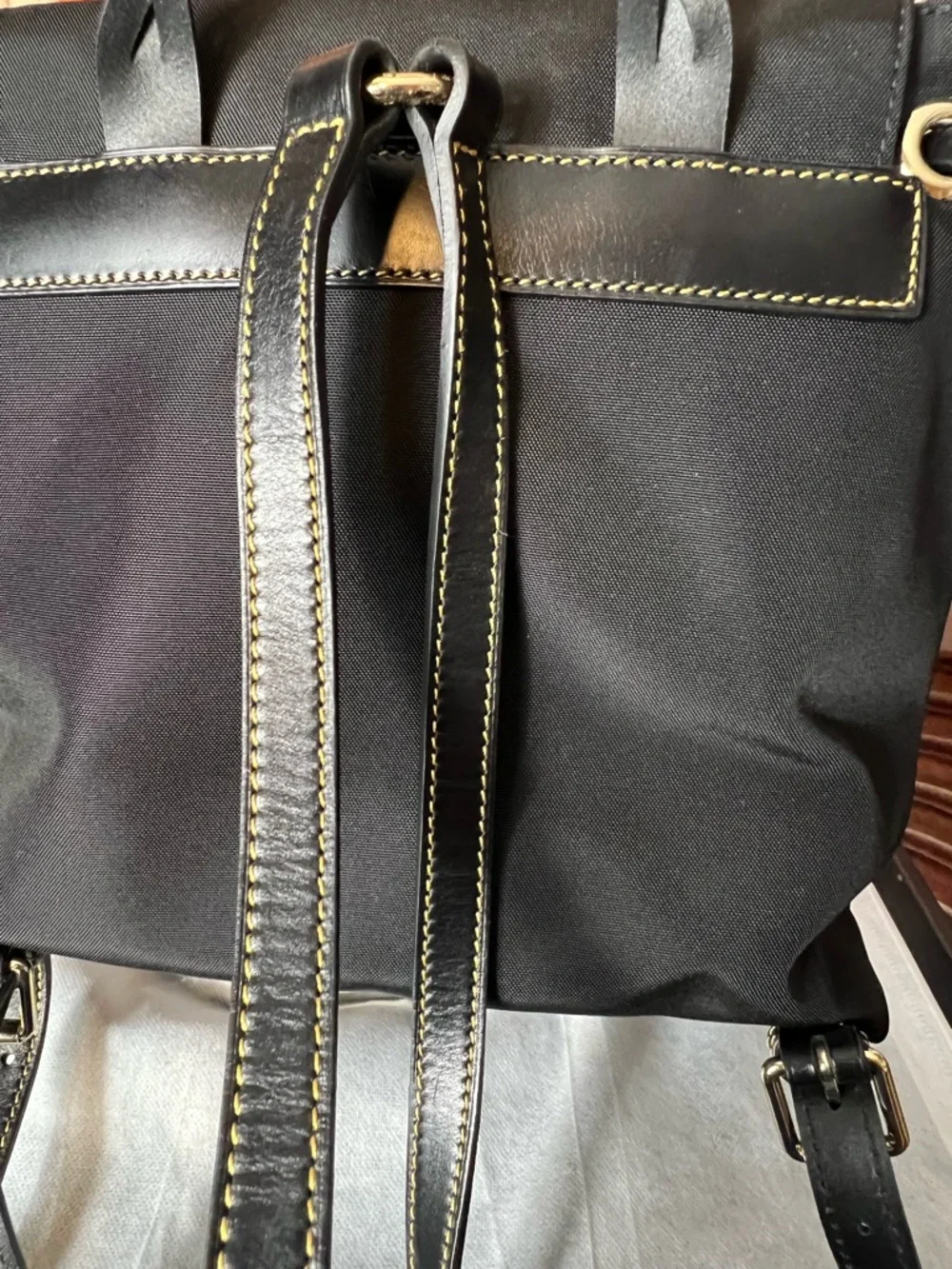 Dooney & Bourke Nylon Flap Backpack features a distinct braided top handle 🌹 - Picture 13 of 13